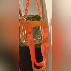 SAFETY ORANGE chained clear hand bag